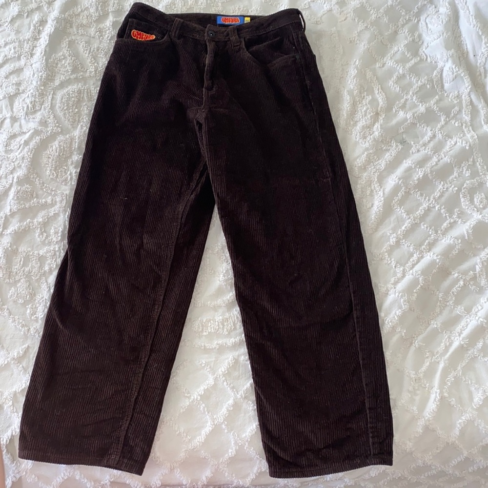 Empyre and brown corduroy pants in a men’s 30